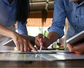 Hand signing a paper